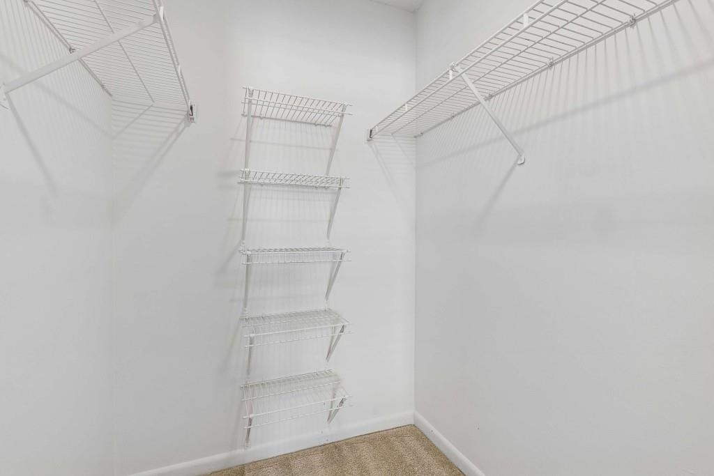 6900 Roswell Road, Unit Q6 Atlanta, GA 30328 - Photo 28 of 38 a view of an empty walk in closet