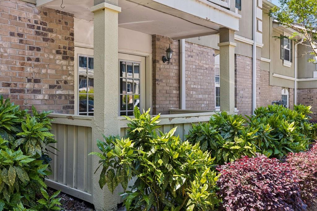6900 Roswell Road, Unit Q6 Atlanta, GA 30328 - Photo 33 of 38 a view of a potted plants next to a building