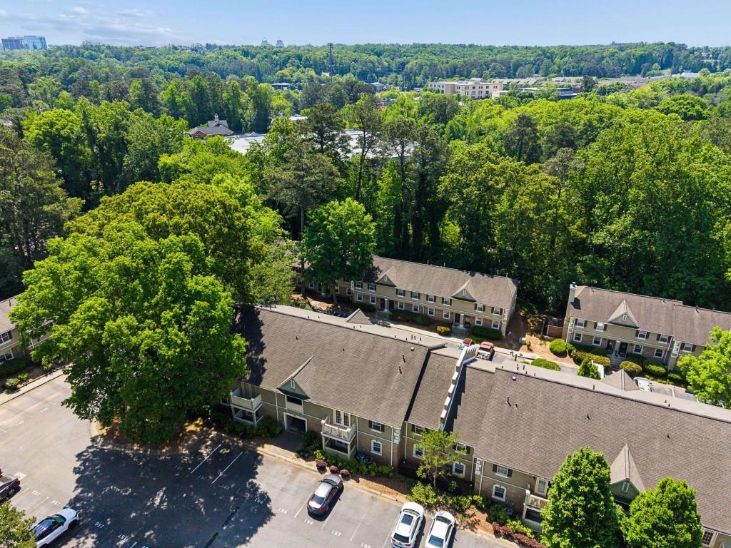 6900 Roswell Road, Unit Q6 Atlanta, GA 30328 - Photo 37 of 38 an aerial view of a house with a yard