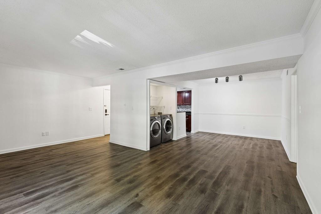 6900 Roswell Road, Unit Q6 Atlanta, GA 30328 - Photo 9 of 38 a view of a room with wooden floor
