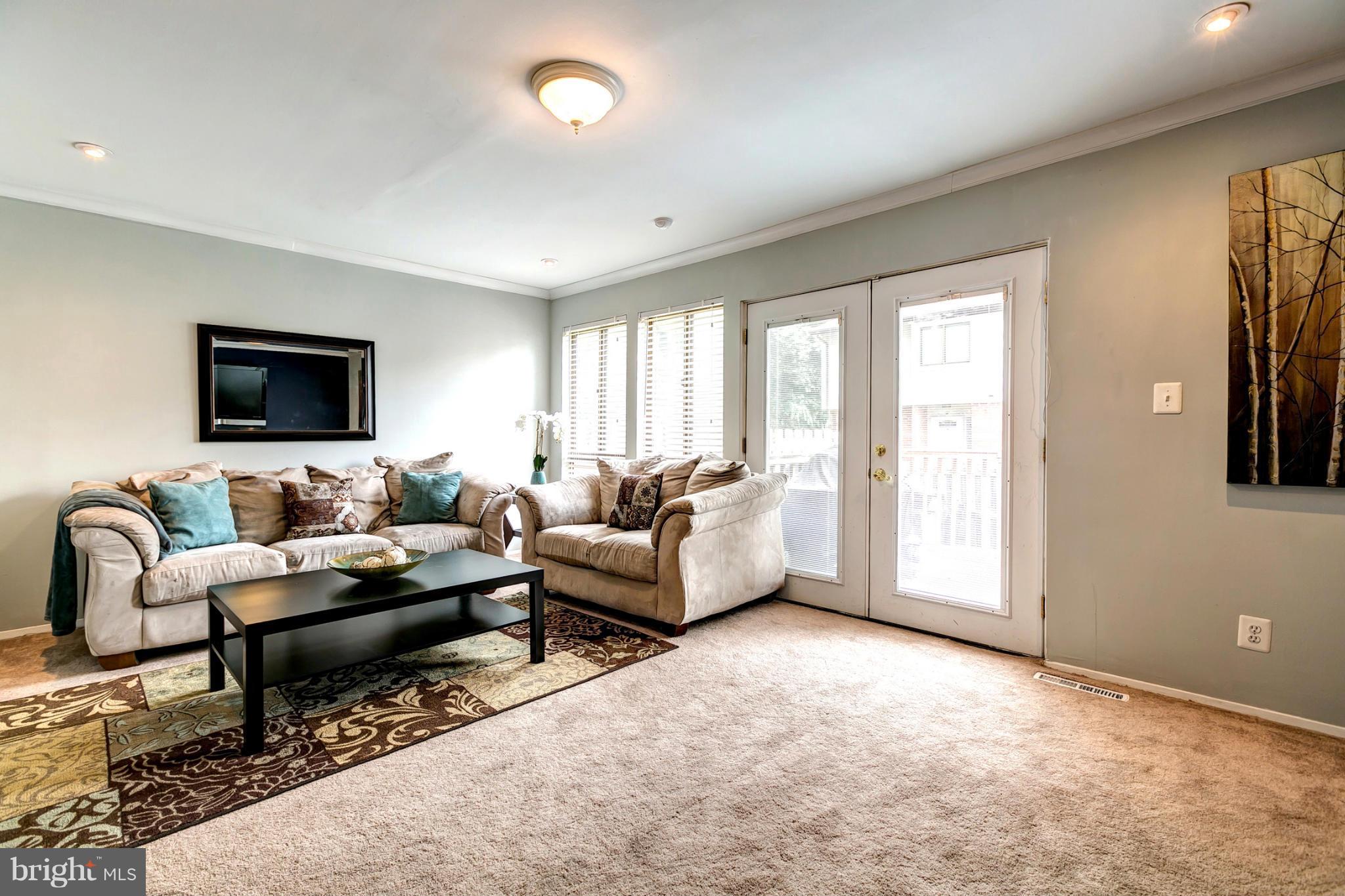 4257 Cayuga Road Randallstown, MD 21133 - Photo 8 of 29 Living Room With French Doors To Rear Deck
