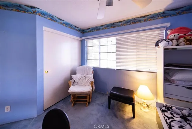 a view of livingroom with furniture and windows