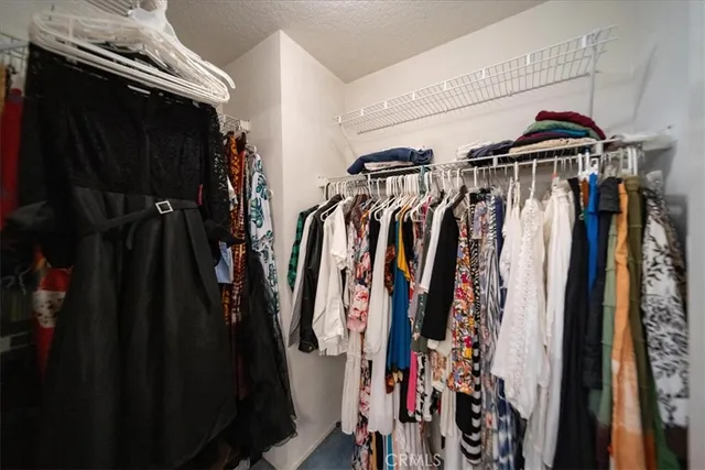 a bathroom with a double vanity sink mirror and shower