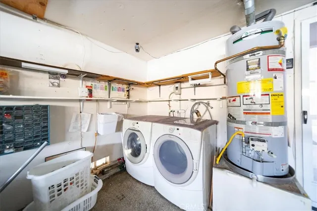 a view of a porch with furniture and garden