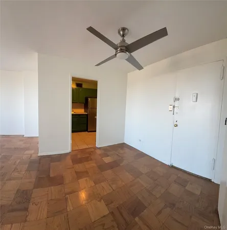 a view of a ceiling fan in a room