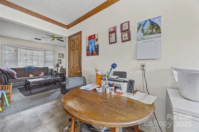 a workspace with furniture and window