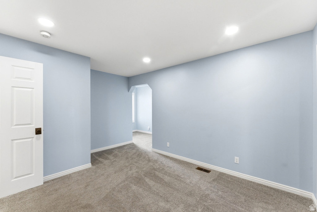 1041 West Grindelwald Court, Unit R5 Midway, UT 84049 - Photo 23 of 44 Generous bedroom layout with an extended area that works well as a workspace, reading nook, or additional living space.