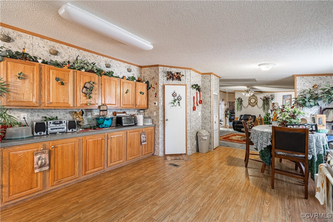 1107 Free State Road Meherrin, VA 23954 - Photo 37 of 45 Kitchen featuring ceiling fan, light hardwood / wo
