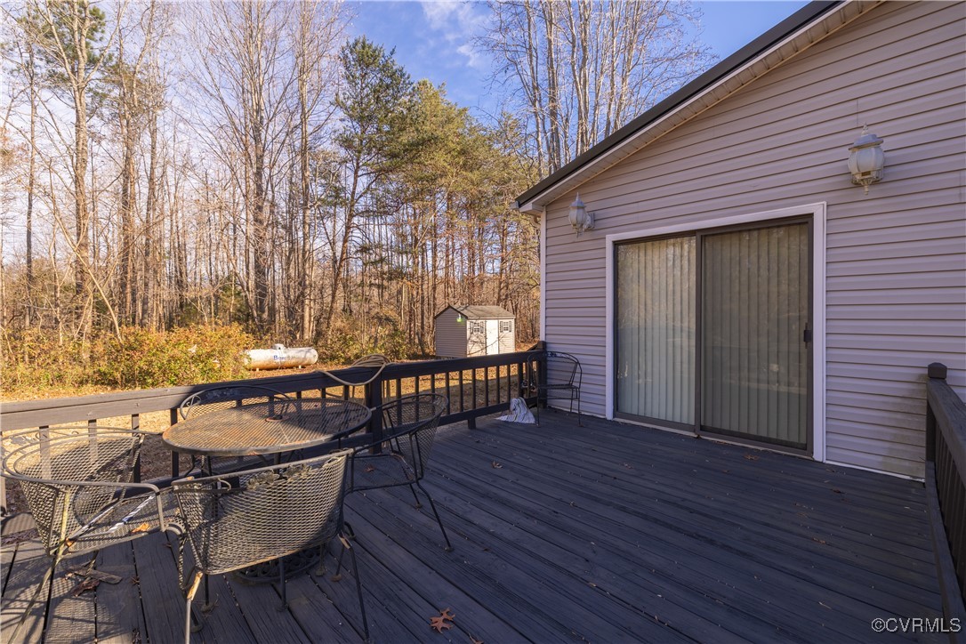 1107 Free State Road Meherrin, VA 23954 - Photo 5 of 45 Wooden terrace with a shed