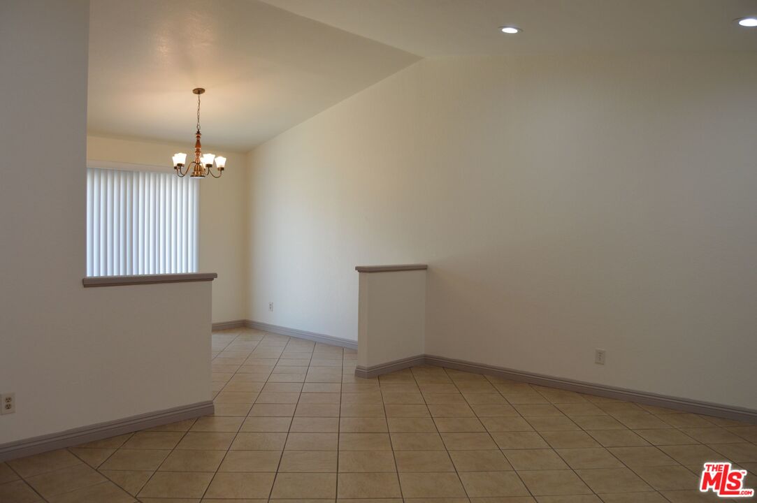 9315 Darren Circle Riverside, CA 92509 - Photo 3 of 41 a view of an empty room with a window