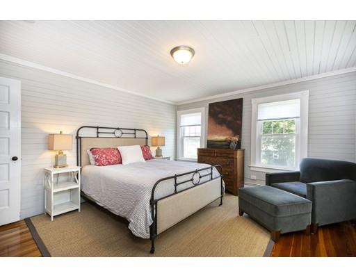 99 Hatherly Road Scituate, MA 02066 - Photo 19 of 31 a bedroom with a bed couch and window