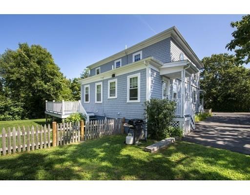 99 Hatherly Road Scituate, MA 02066 - Photo 31 of 31 a front view of a house with a yard