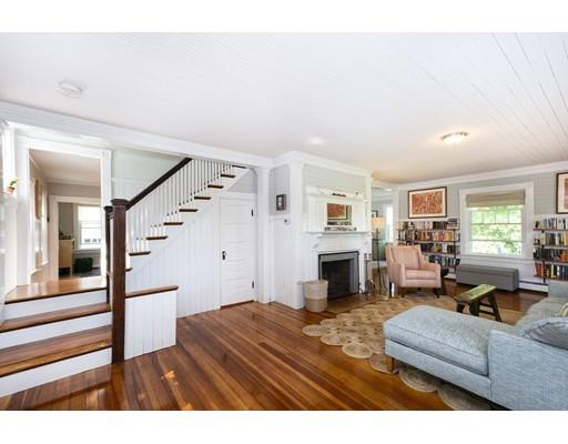 99 Hatherly Road Scituate, MA 02066 - Photo 6 of 31 a living room with furniture and a fireplace