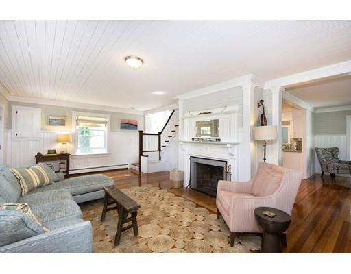 99 Hatherly Road Scituate, MA 02066 - Photo 8 of 31 a living room with furniture and a fireplace