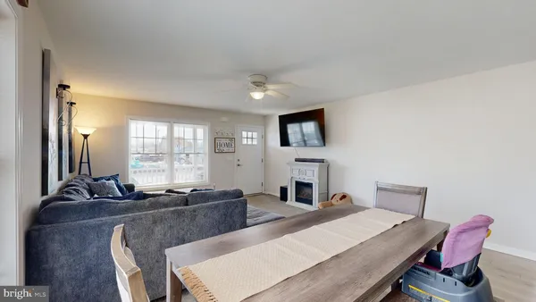 a bed room with a bed furniture and a flat screen tv
