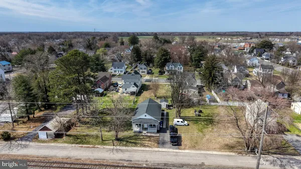 an aerial view of residential house with outdoor space