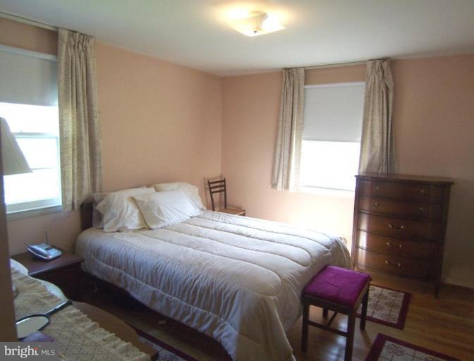 3825 Cherrybrook Road Randallstown, MD 21133 - Photo 6 of 11 Spacious Master Bedroom w/ Wood Floors