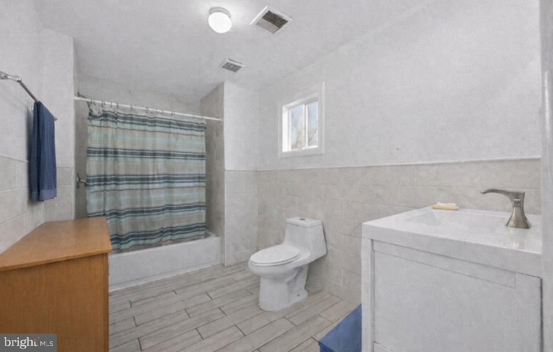 38 East Hancock Street Riverside, NJ 08075 - Photo 13 of 13 a bathroom with a sink toilet and shower