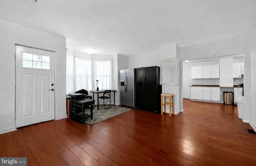 38 East Hancock Street Riverside, NJ 08075 - Photo 3 of 13 a view of kitchen with refrigerator and wooden floor