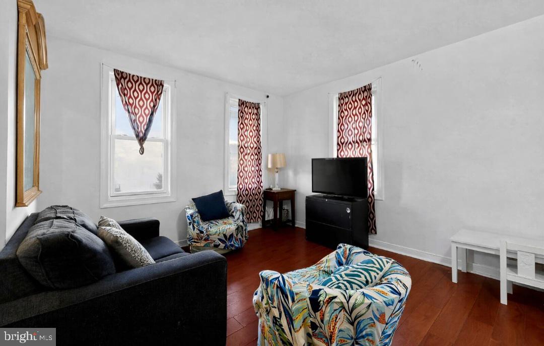 38 East Hancock Street Riverside, NJ 08075 - Photo 5 of 13 a living room with furniture and a flat screen tv