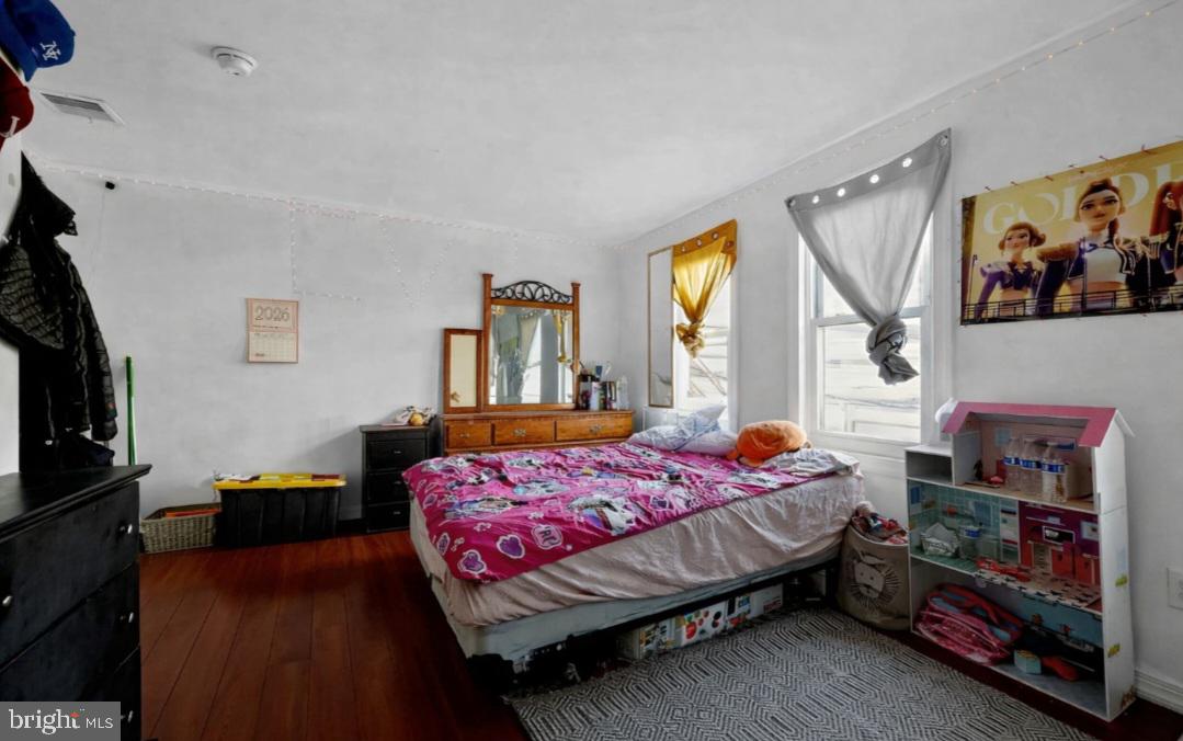 38 East Hancock Street Riverside, NJ 08075 - Photo 10 of 13 a bedroom with a bed and a window