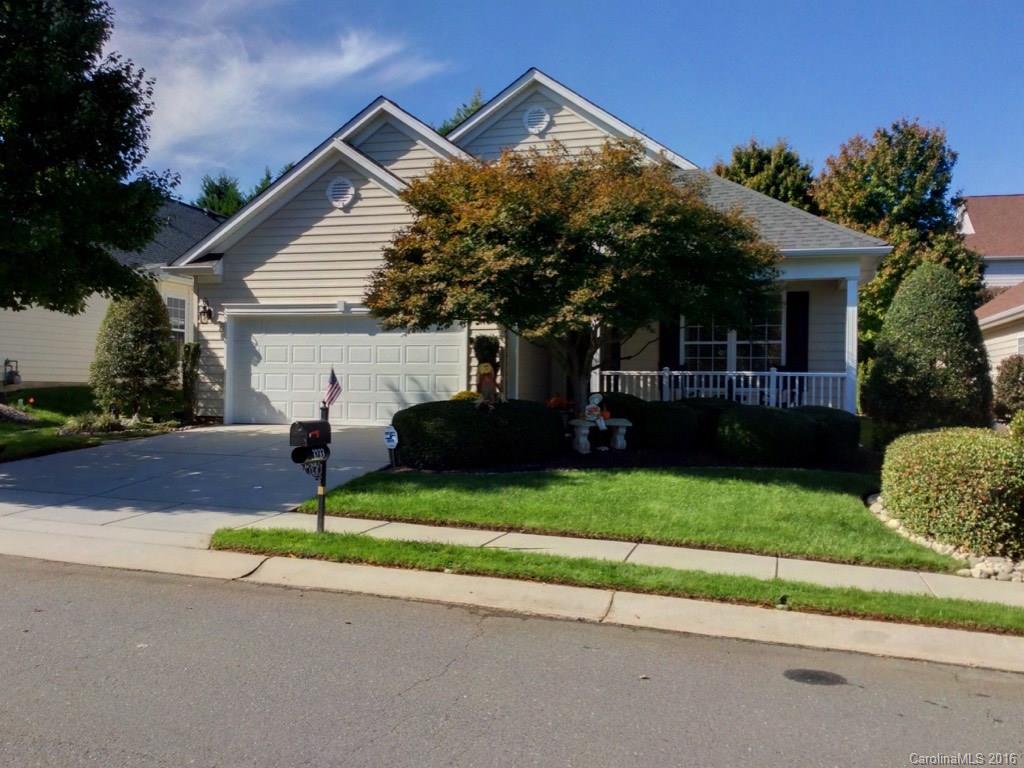 3233 Sapphire Lane Fort Mill, SC 29708 - Photo 1 of 24 a front view of a house with a yard and garage