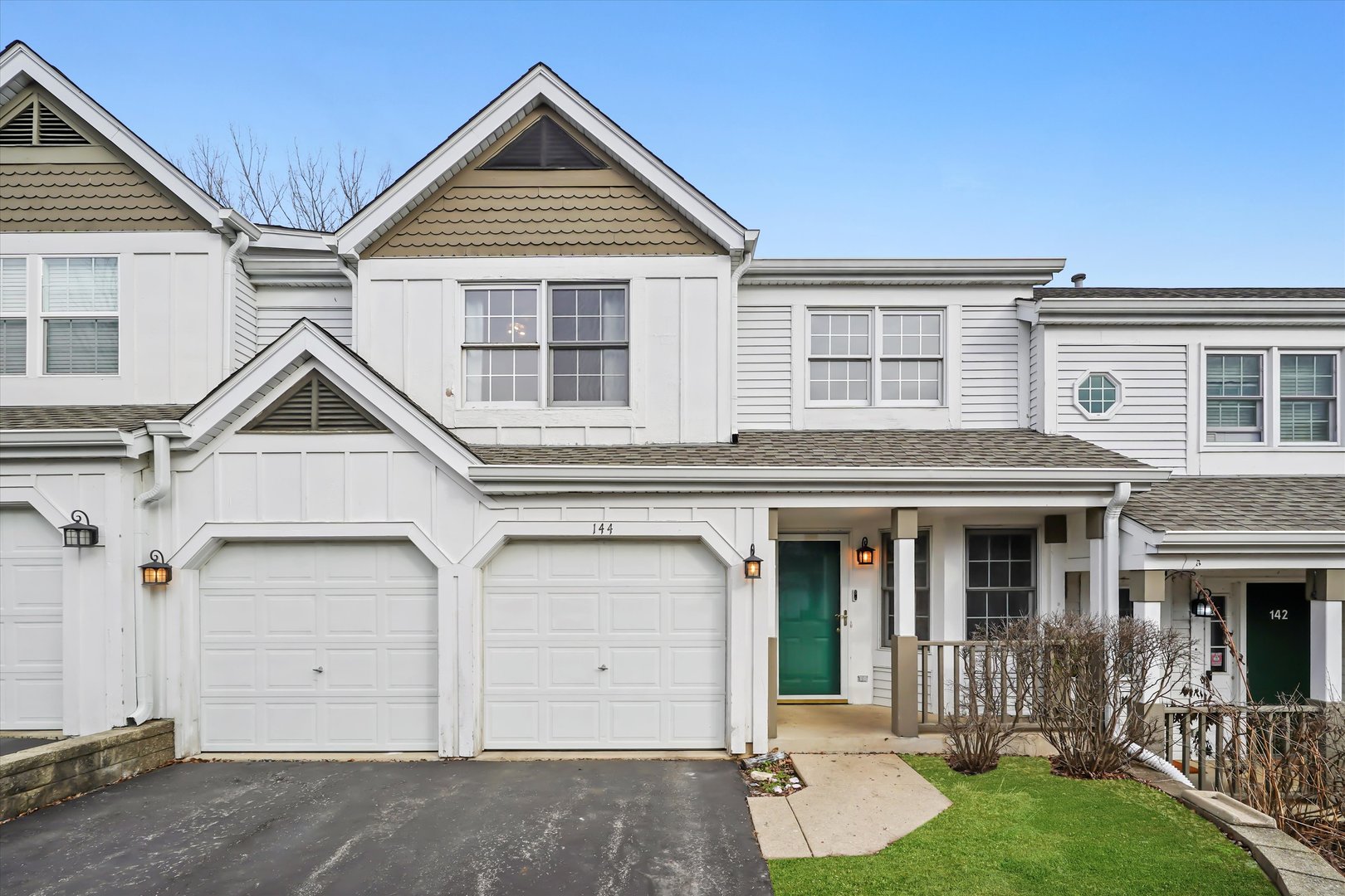 144 Spring Court North Carpentersville, IL 60110 - Photo 1 of 36 front view of a house with a yard