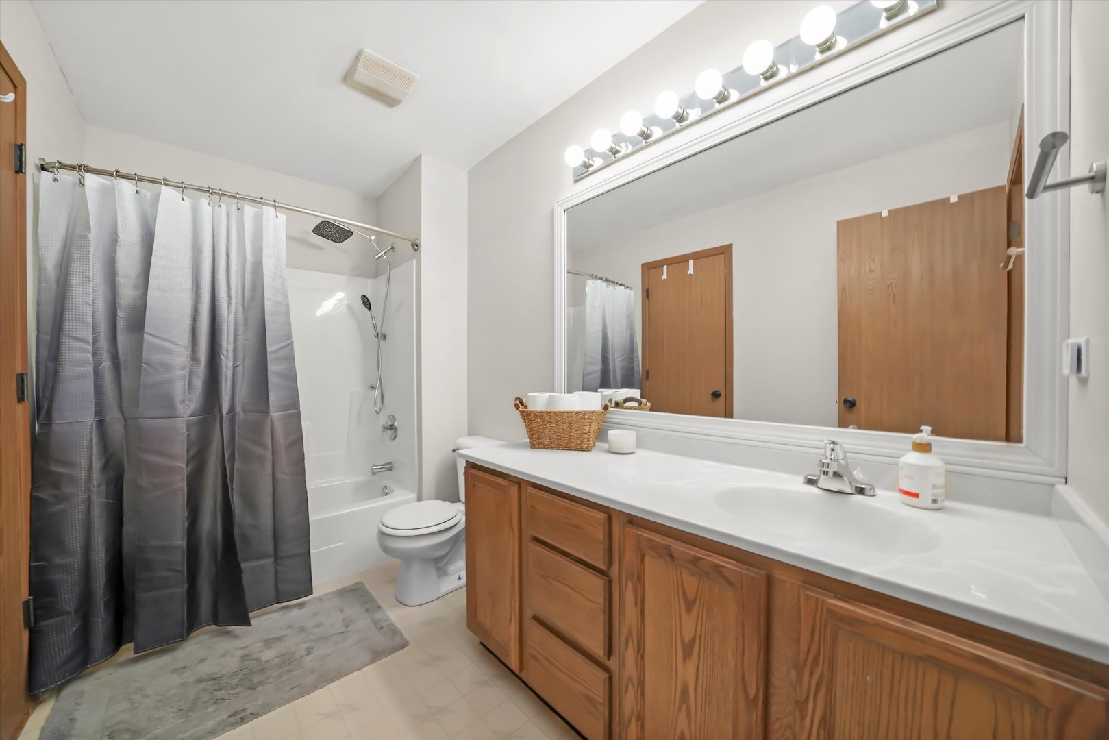 144 Spring Court North Carpentersville, IL 60110 - Photo 18 of 36 a spacious bathroom with a double vanity sink toilet and shower