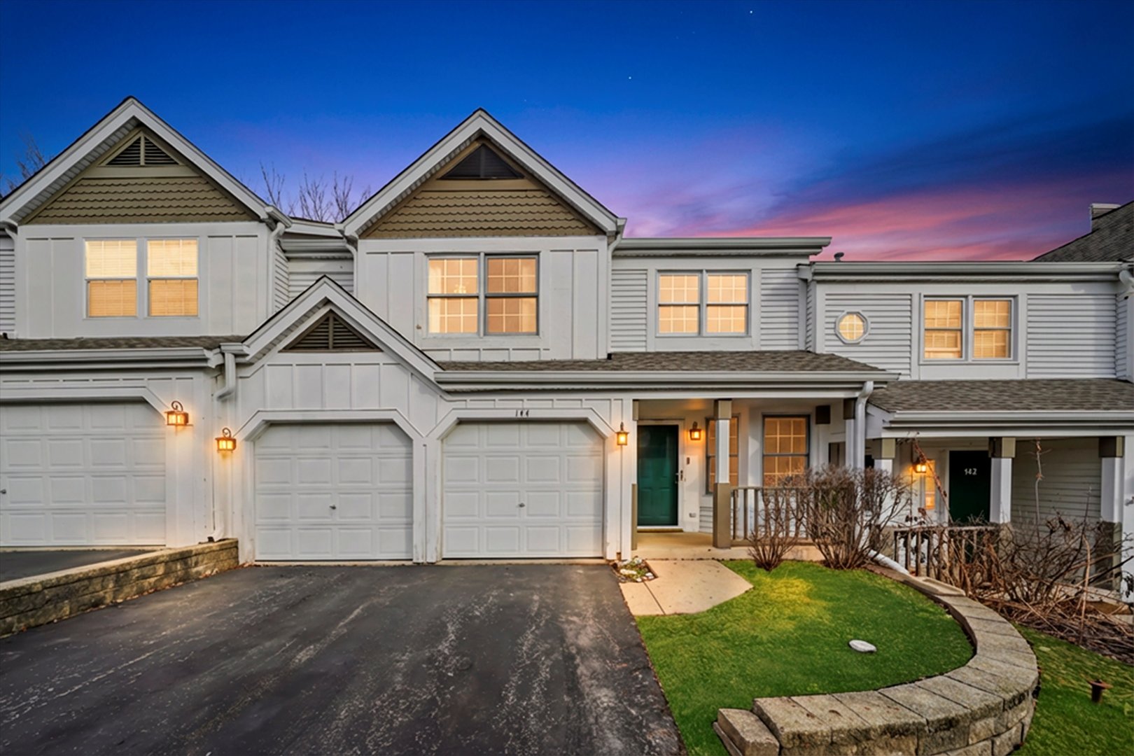 144 Spring Court North Carpentersville, IL 60110 - Photo 2 of 36 front view of a house with a yard