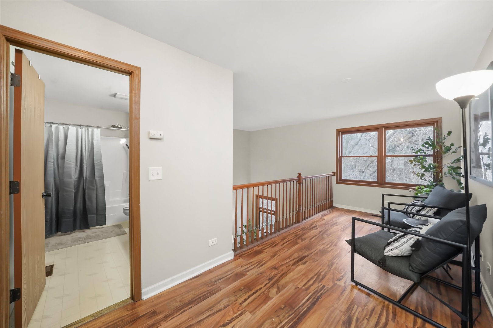 144 Spring Court North Carpentersville, IL 60110 - Photo 21 of 36 a living room with furniture and a window