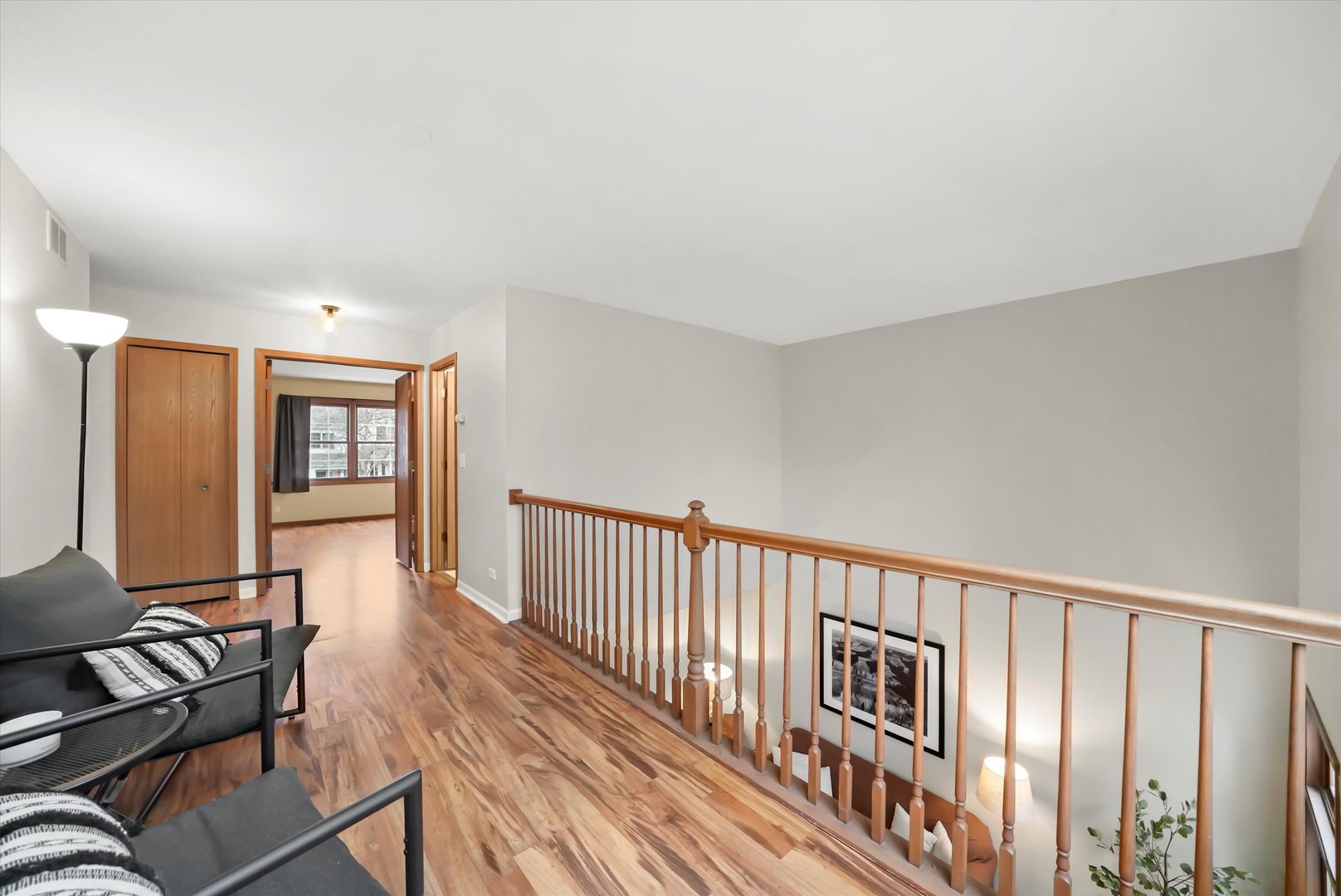 144 Spring Court North Carpentersville, IL 60110 - Photo 24 of 36 a living room with furniture and wooden floor