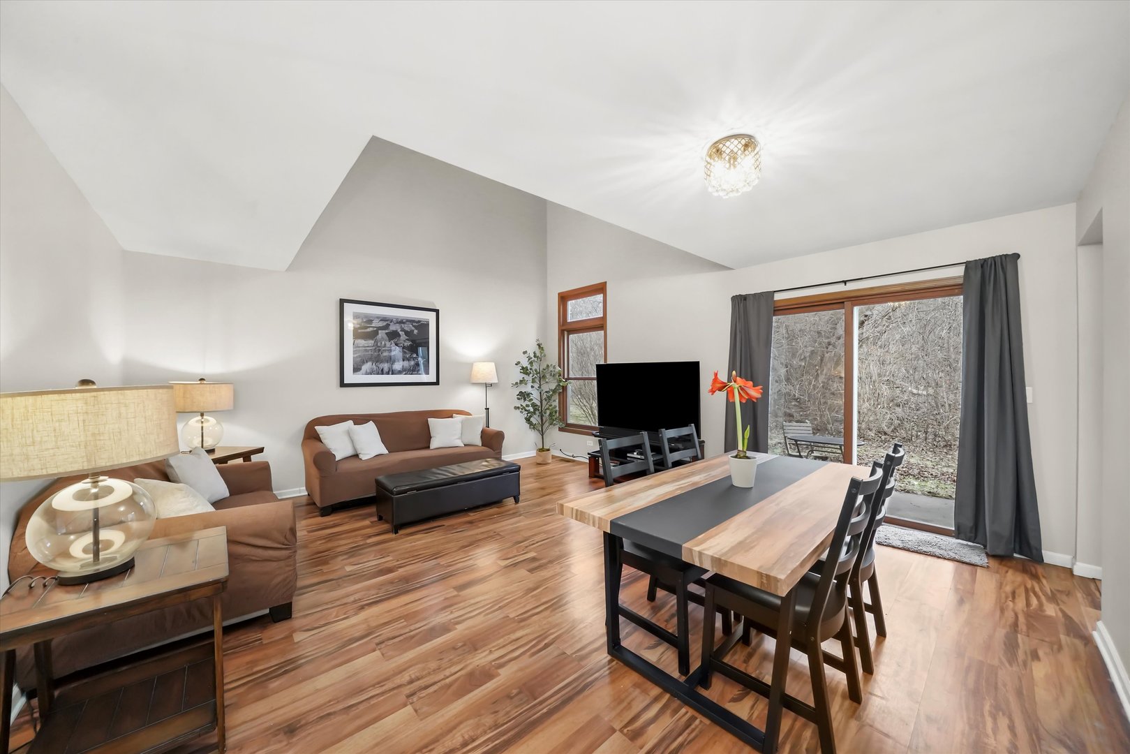 144 Spring Court North Carpentersville, IL 60110 - Photo 9 of 36 a living room with furniture and a flat screen tv