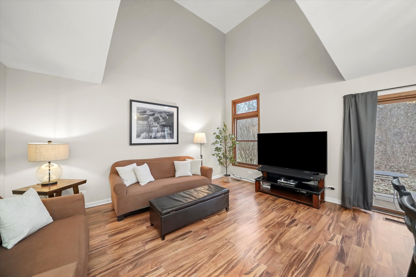 144 Spring Court North Carpentersville, IL 60110 - Photo 10 of 36 a living room with furniture and a flat screen tv