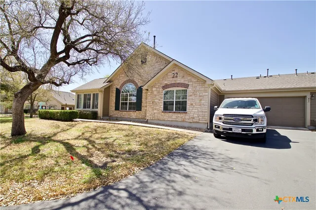 a car parked in front of a house