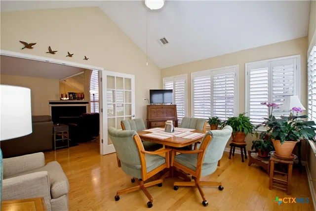 a view of a dining room with furniture