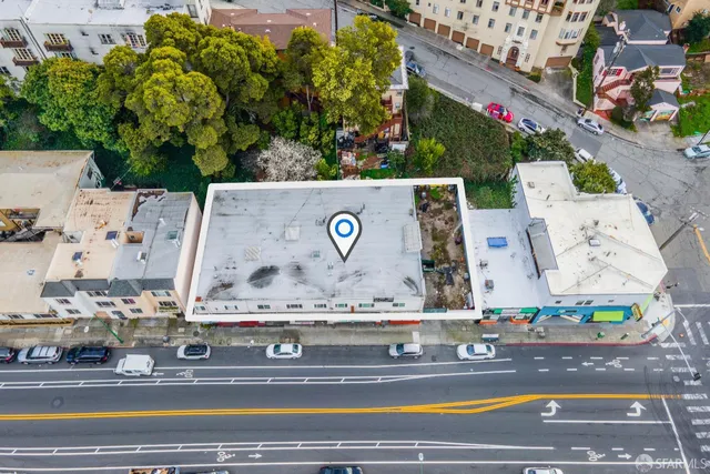 a view of building with sign board