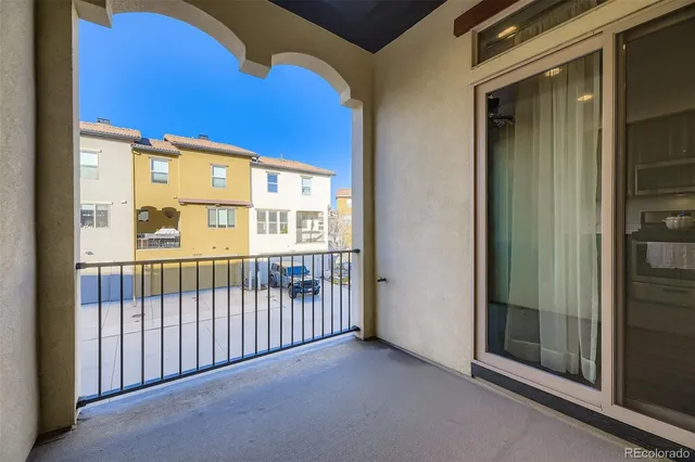 a view of a porch with a floor to ceiling window