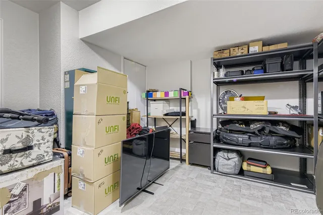 a kitchen with stainless steel appliances granite countertop a refrigerator and a stove