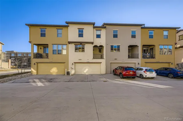 a view of a cars parked in front of a building