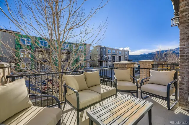 a view of a terrace with furniture