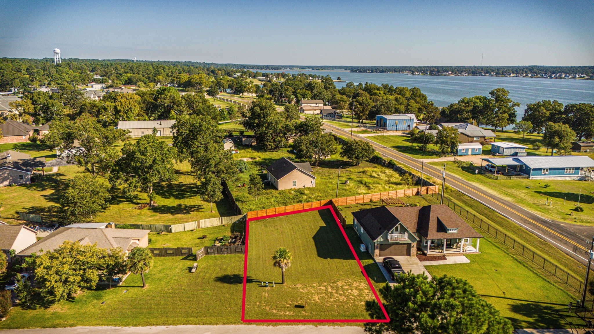 Lot 14 Treasure Point Onalaska, TX 77360 - Photo 7 of 27 an aerial view of residential houses with outdoor space