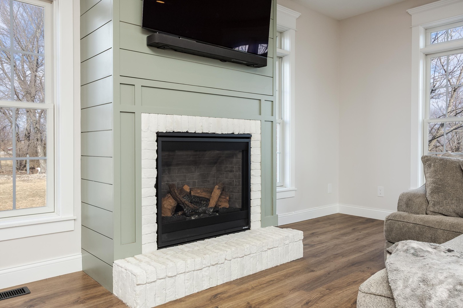 1651 North 2800 East Road Le Roy, IL 61752 - Photo 11 of 90 a living room with furniture and a fireplace