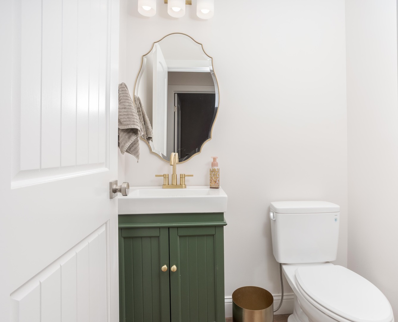 1651 North 2800 East Road Le Roy, IL 61752 - Photo 24 of 90 a bathroom with a toilet sink and mirror