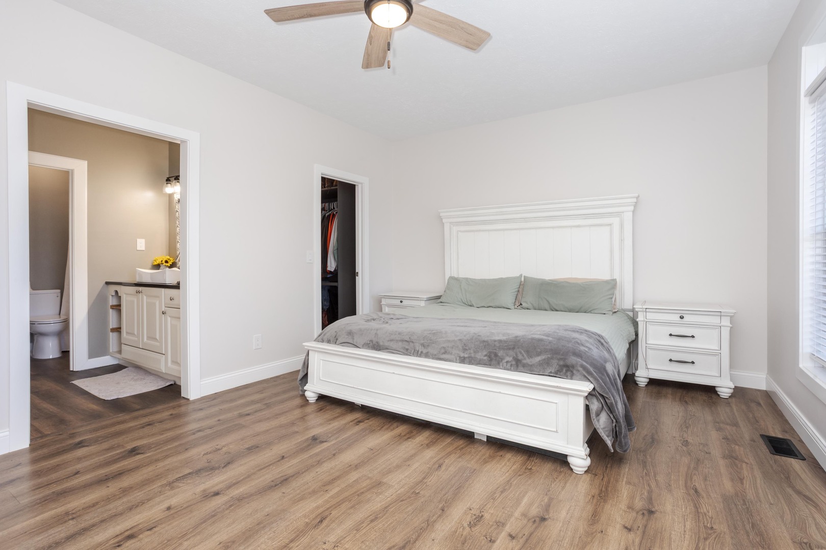 1651 North 2800 East Road Le Roy, IL 61752 - Photo 25 of 90 a bedroom with a bed and wooden floor