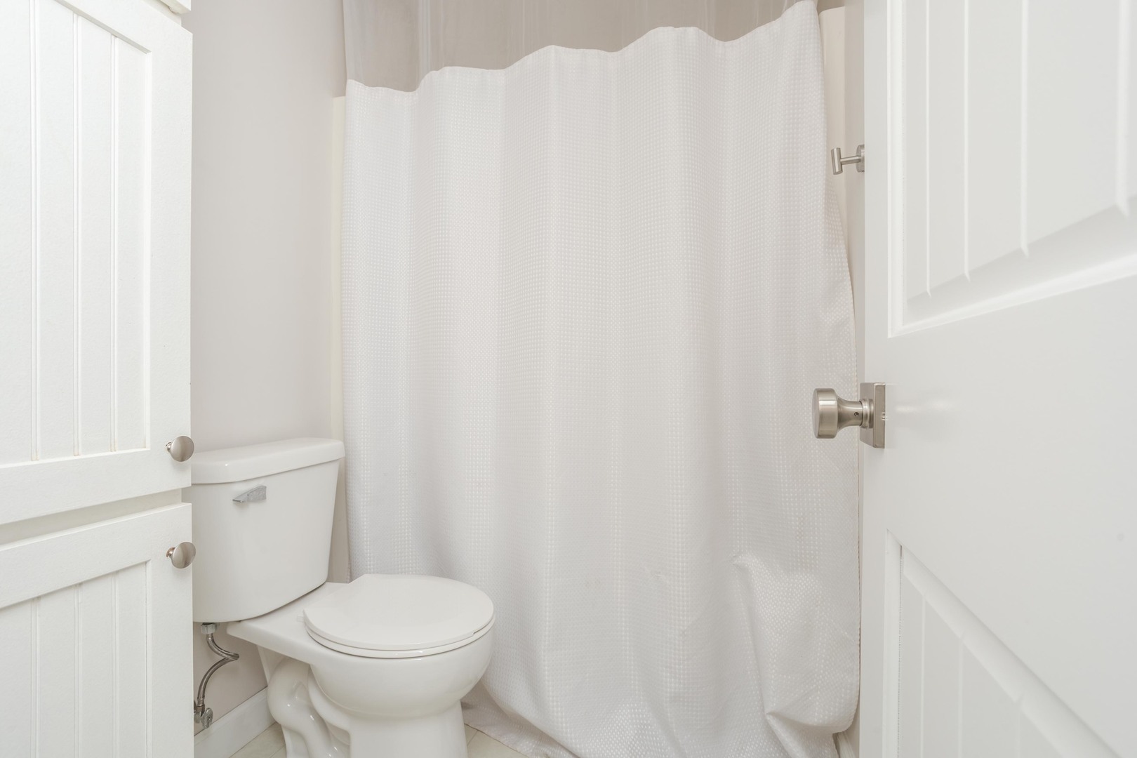 1651 North 2800 East Road Le Roy, IL 61752 - Photo 32 of 90 a white toilet sitting next to a shower