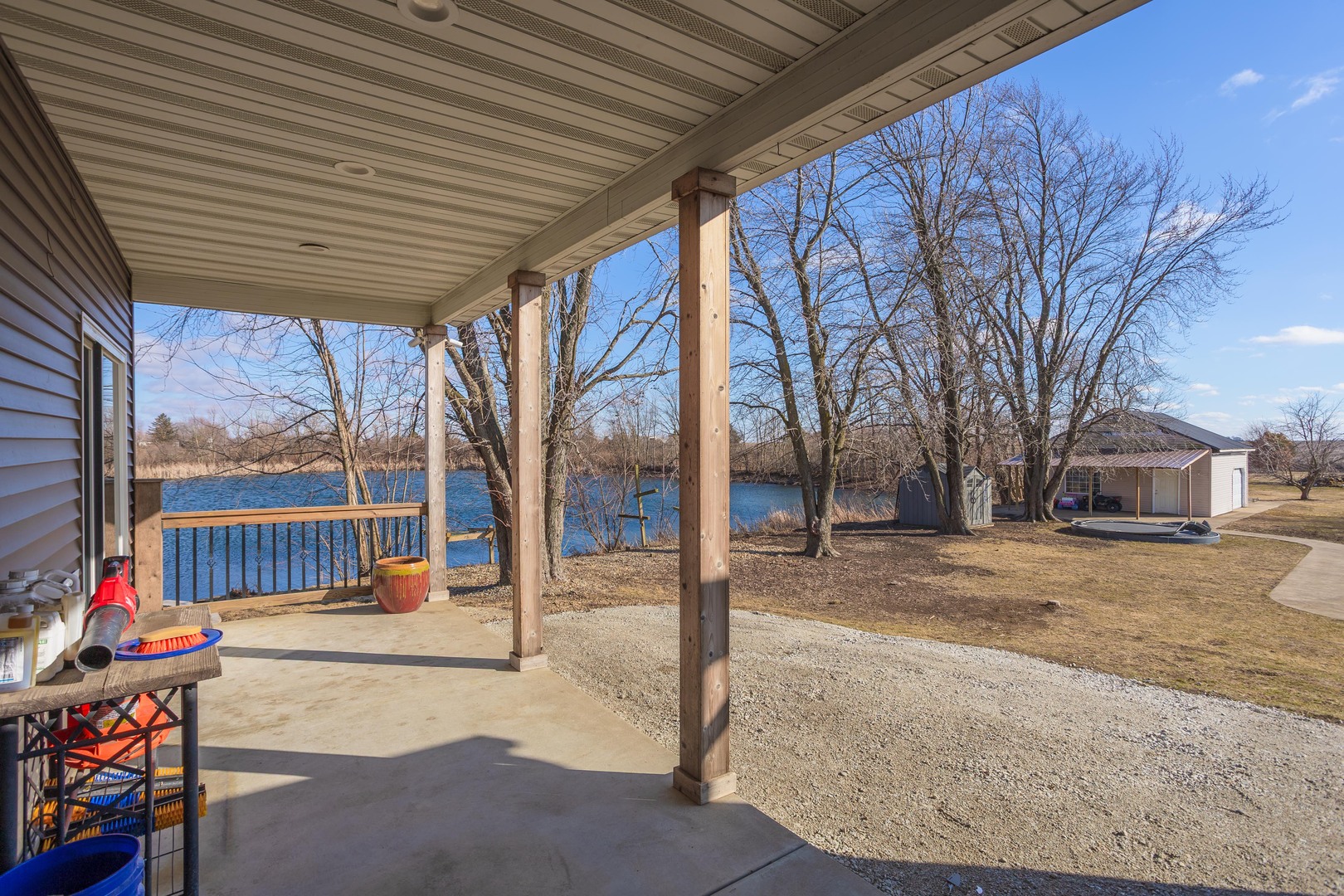 1651 North 2800 East Road Le Roy, IL 61752 - Photo 47 of 90 a view of a patio with a table and chairs and wooden fence