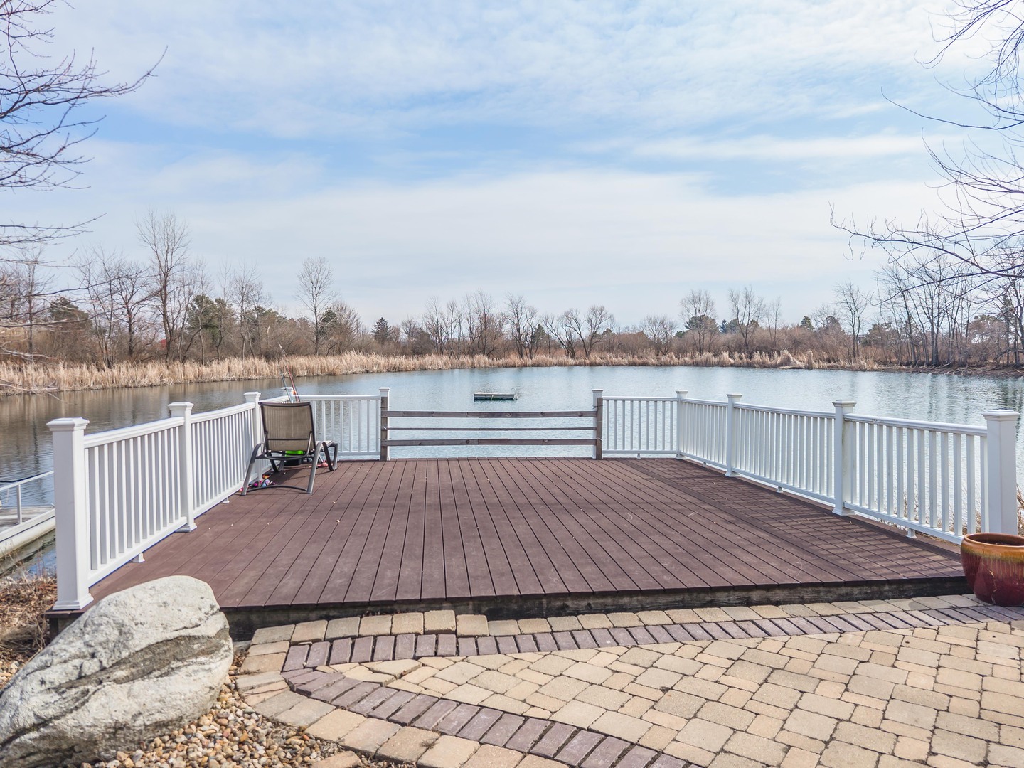 1651 North 2800 East Road Le Roy, IL 61752 - Photo 59 of 90 a view of a terrace with wooden floor and fence