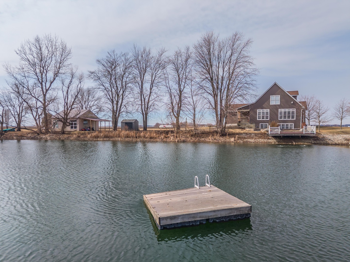 1651 North 2800 East Road Le Roy, IL 61752 - Photo 67 of 90 a view of a lake with houses and lake view