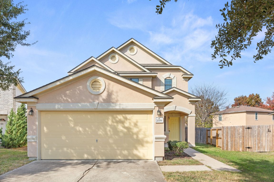2009 Perkins Place Georgetown, TX 78626 - Photo 2 of 36 a view of a street sign of a house