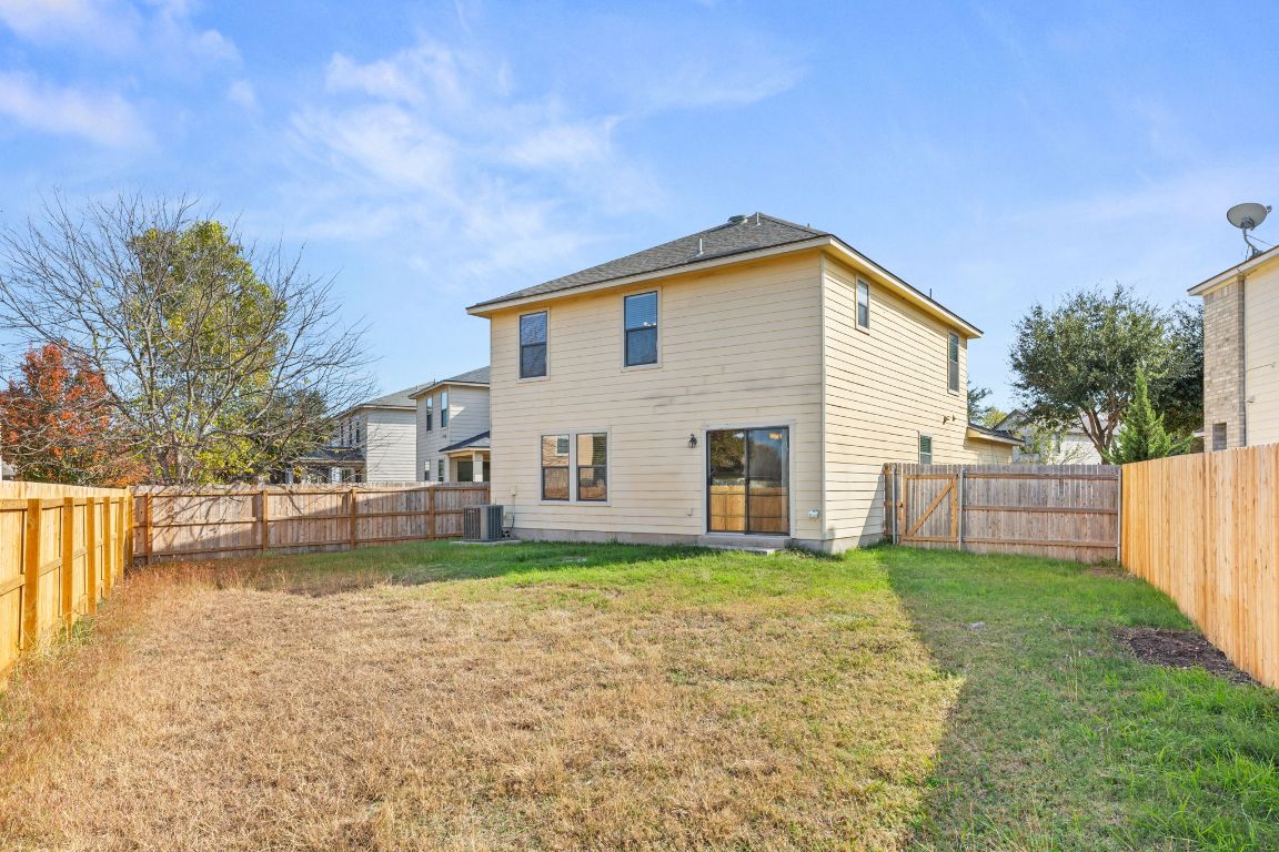 2009 Perkins Place Georgetown, TX 78626 - Photo 34 of 36 a view of a house with a yard